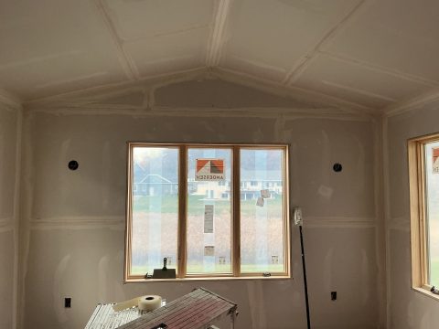 Newly installed window in an interior remodeling project.