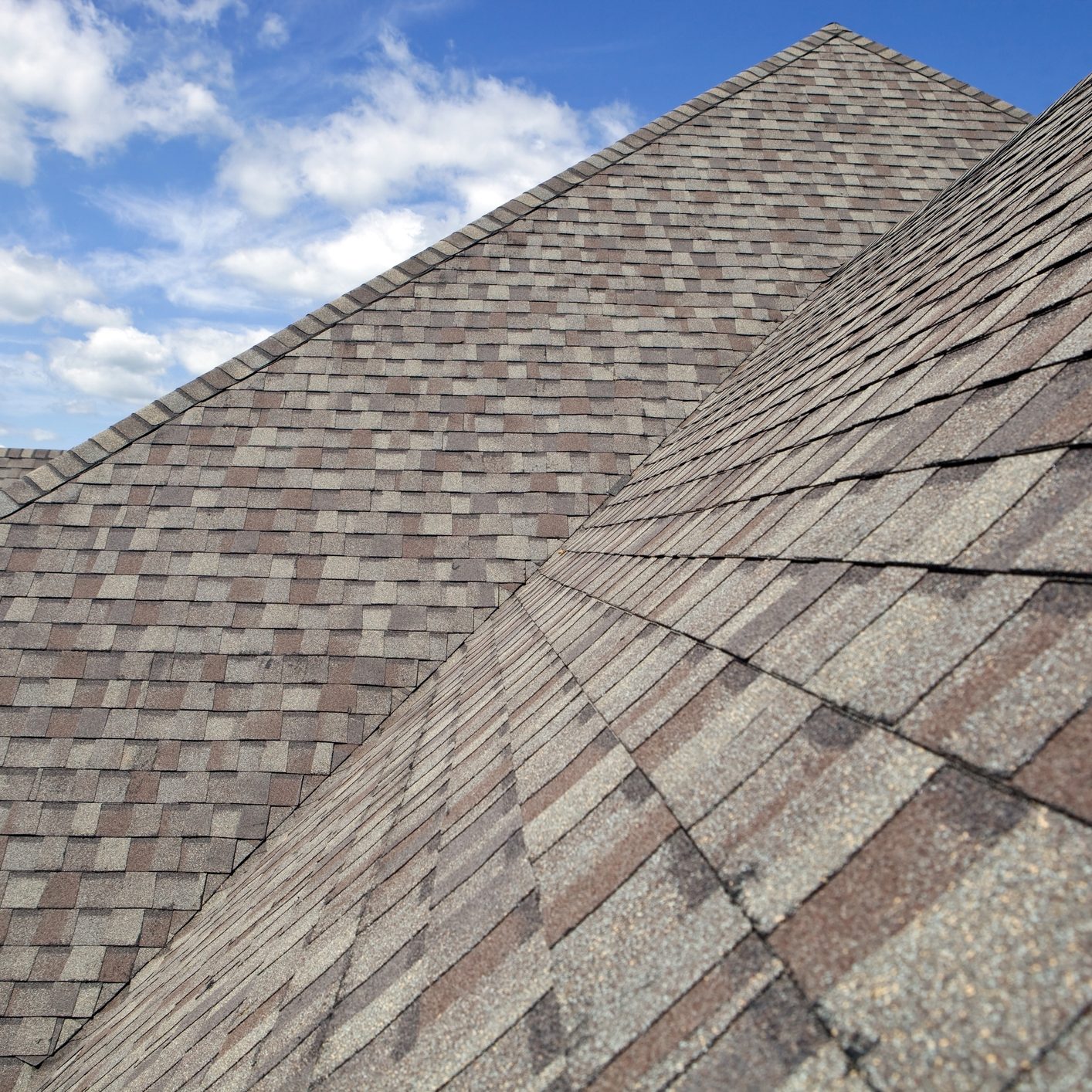 New Shingled Roof with Blue Sky Background
