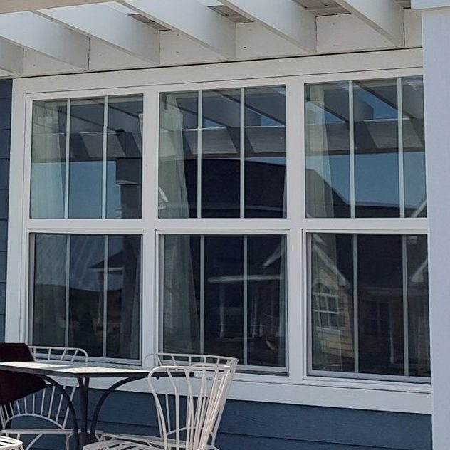 arrow-exterior-double-hung-blue-craftsman-home-white-window-door-pergola-madison-wi