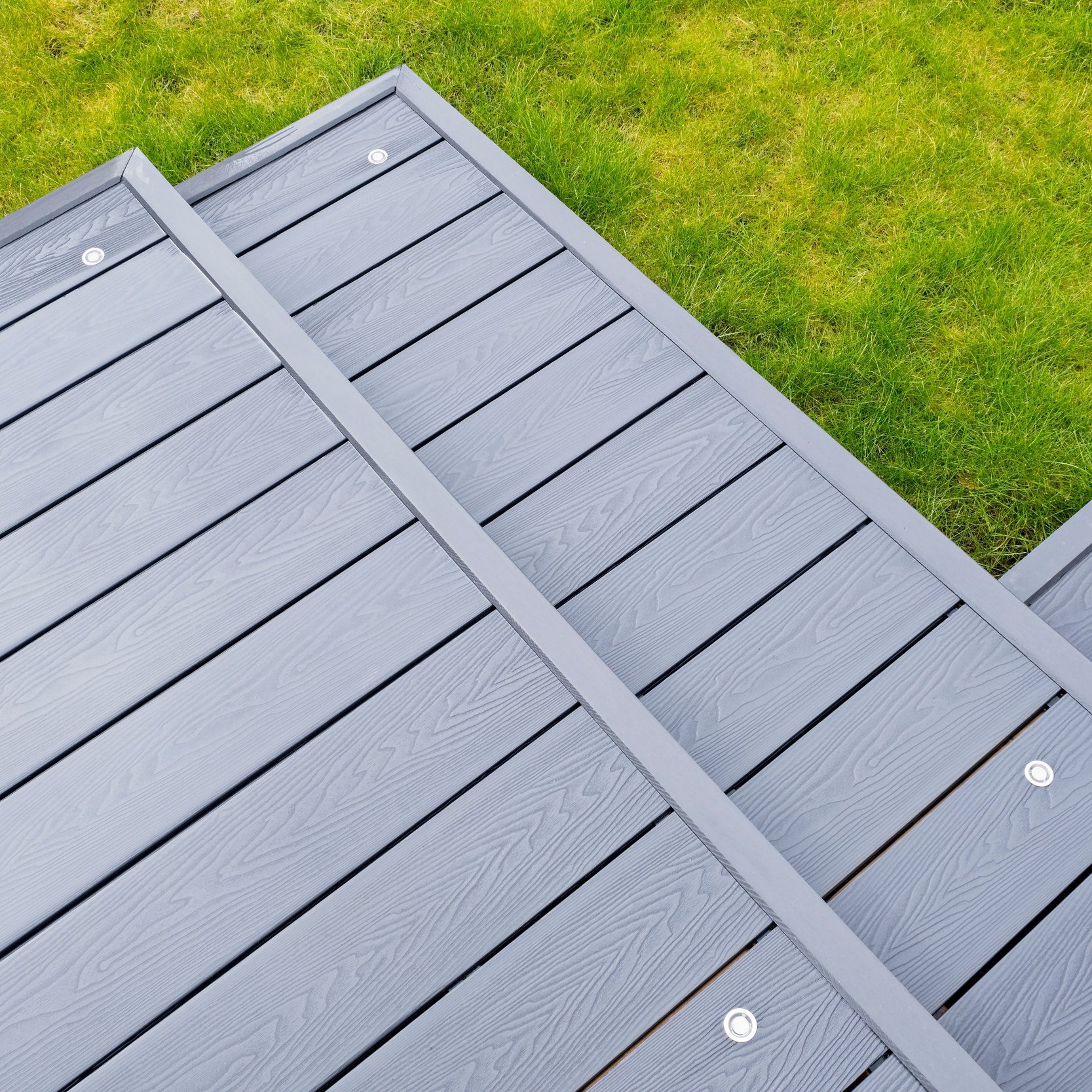 Ash,Grey,Composite,Decking,On,A,Rainy,Wet,Day,Showing