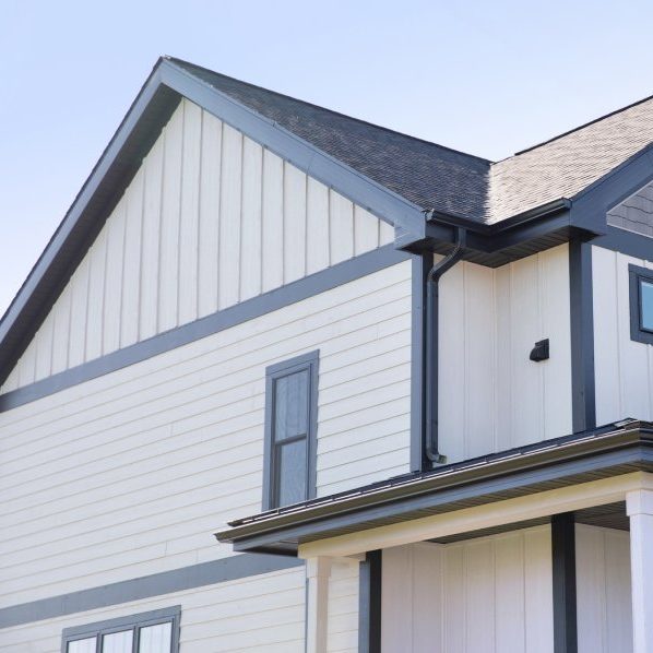 modern-farmhouse-board-and-batten-vertical-siding-installation-arrow-exterior-design