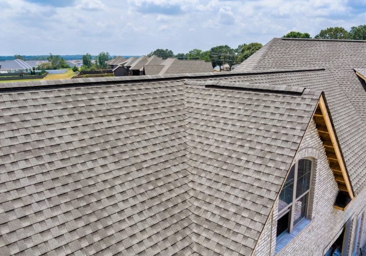 New asphalt shingle roof on a residential home by Arrow Exteriors.